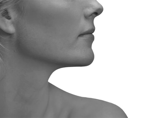 Side profile of a woman's nose and chin